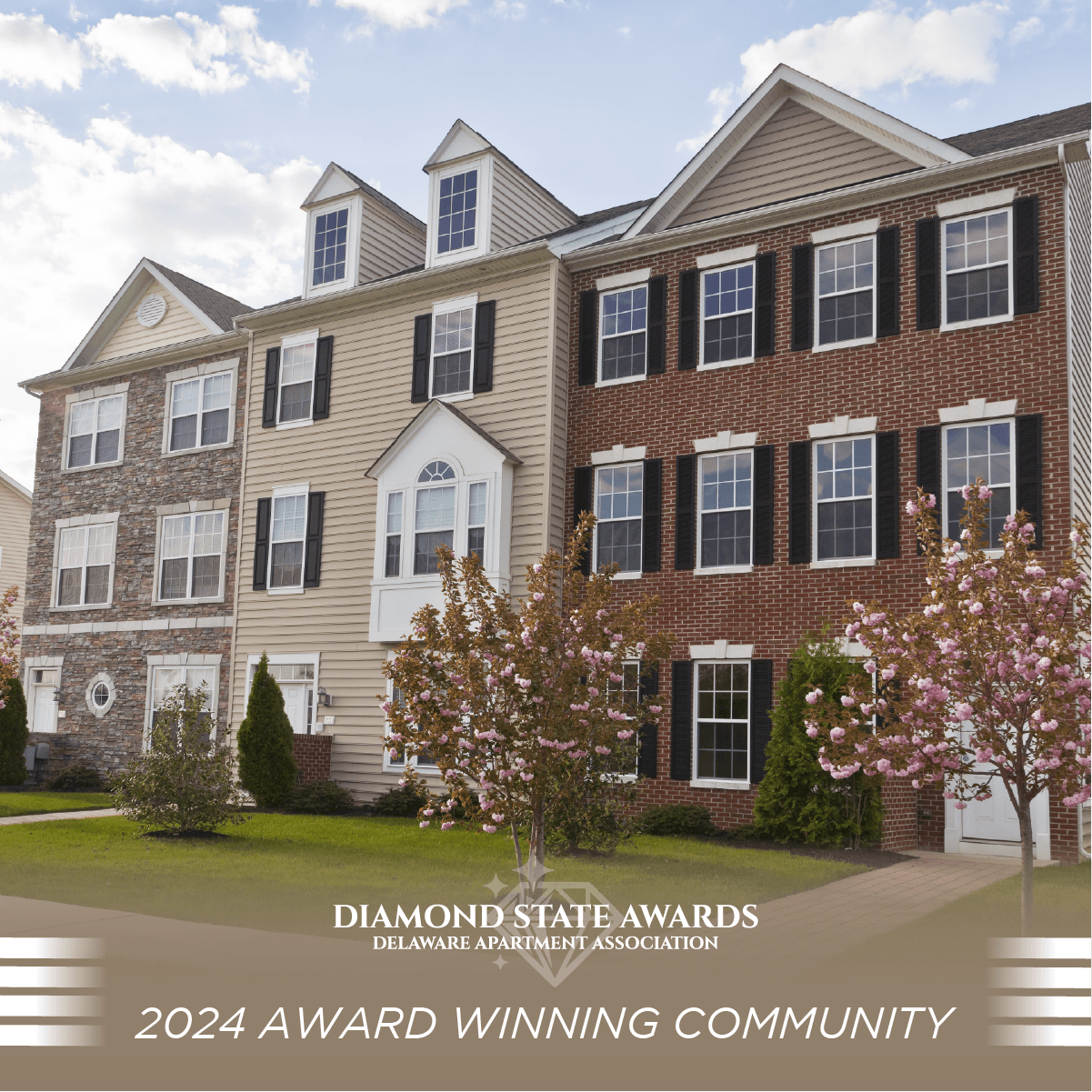 A building with the text "Diamond State Awards 2024 Award Winning Community" in front of it.